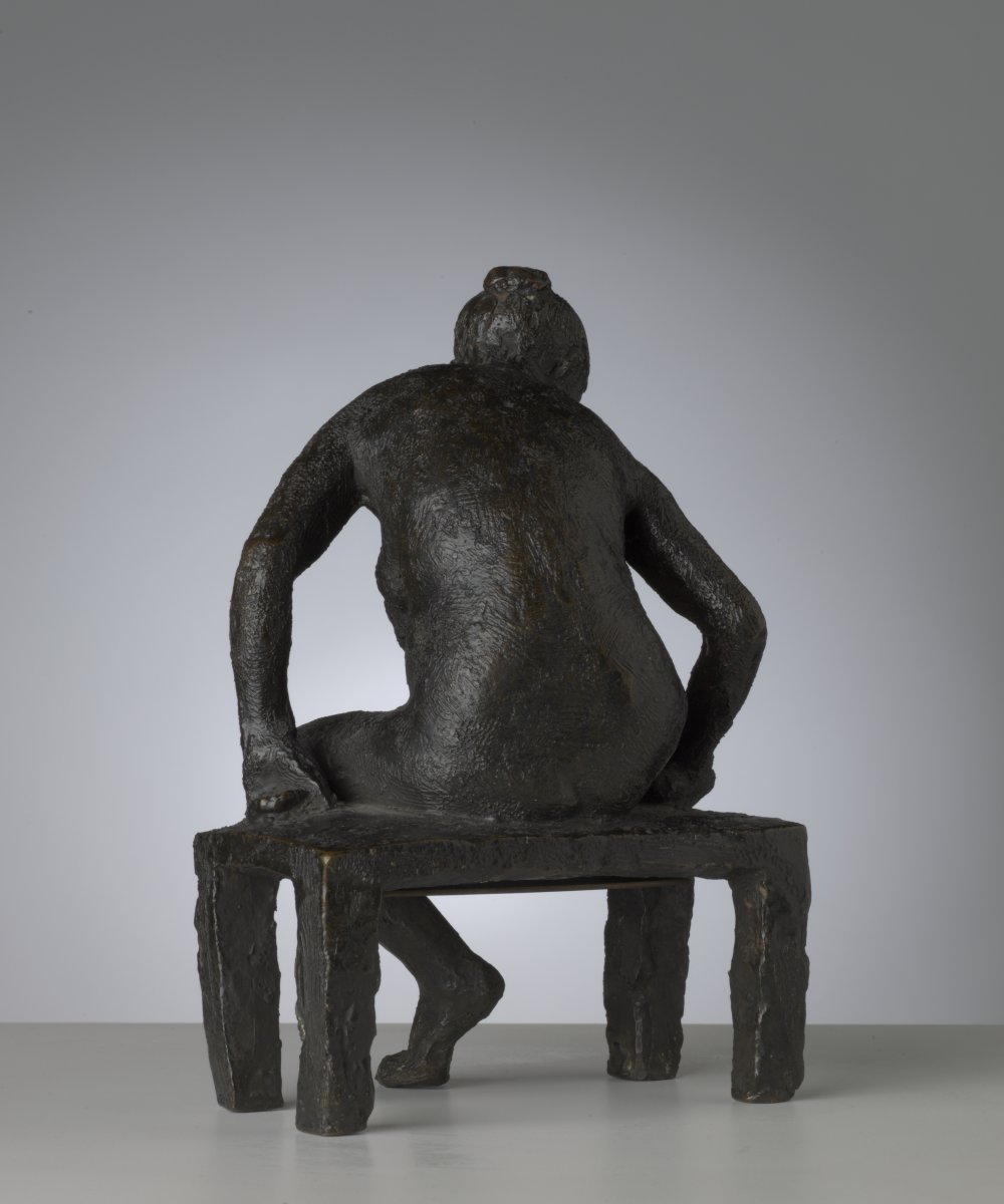 Image of Nude Seated on a Bench Holding her Right Foot