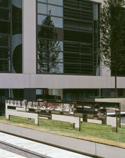 Image of Signature Sculpture to left of entrance of Home Office building