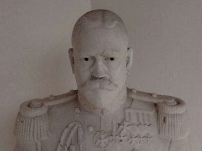A bust of King George V in military uniform