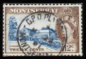 A replica postage stamp featuring Elizabeth II against the backdrop of Montserrat