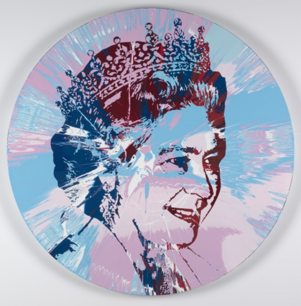 In a round, black and white portrait, the Queen looks to the side with a smile. Streaks of pink and blue are splashed over her face.