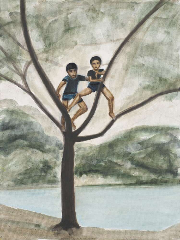 Two small boys wearing T-shirts and shorts are climbing a bare tree that's growing by the side of a bed of water